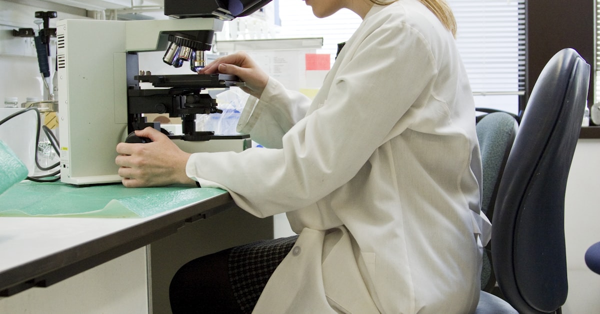 Laboratory scientist analyzing a drinking water sample at a Maine water testing laboratory